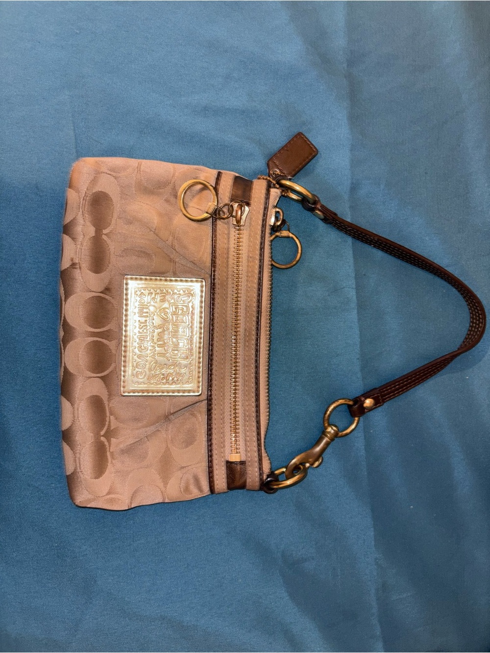 Coach Brown Signature Wristlet with Gold Plaque and Dark Brown Strap